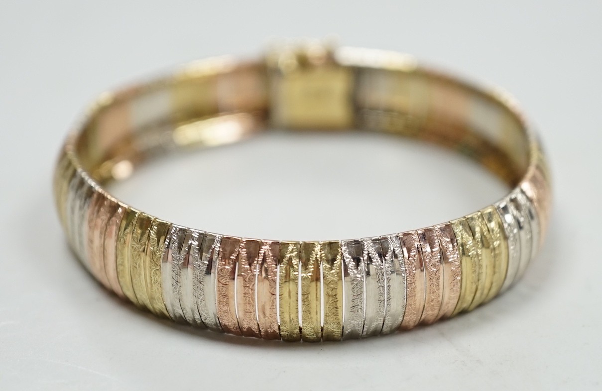 A modern Italian three colour 9ct gold bracelet, 18cm, 18 grams.